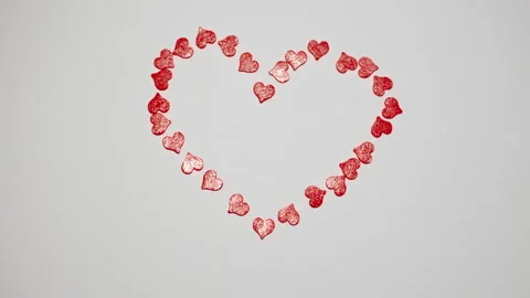 Many Red Hearts stop motion animation collide together in One beating heart for Stock Footage 231572115