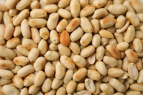Many roasted peanuts as background, top view Stock Photos
