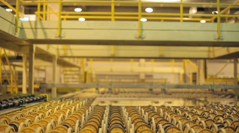 Many rollers rolled products. Modern high-tech conveyor shifting production Stock Footage 59593076