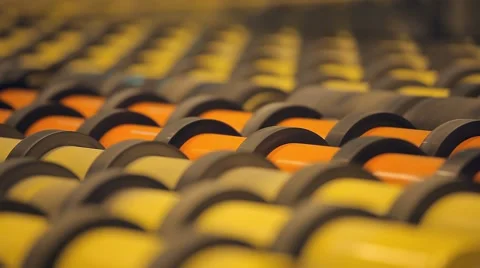 Many rollers rolled products. Modern high-tech conveyor shifting production Stock Footage 59594506