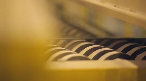 Many rollers rolled products. Modern high-tech conveyor shifting production Stock Footage 60360993