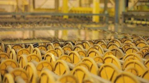 Many rollers rolled products. Modern high-tech conveyor shifting production Stock Footage 60388438