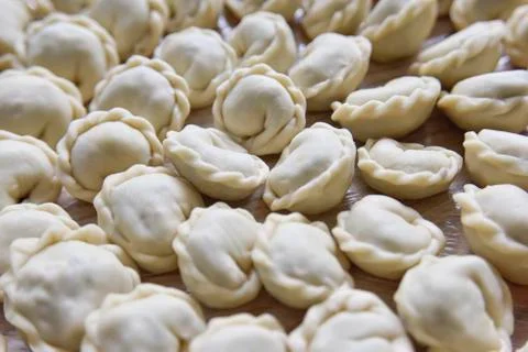 Many round dumplings from the close side view Stock Photos
