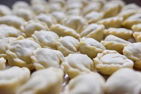 Many round dumplings from the close side view Stock Photos