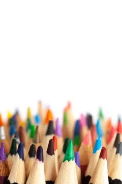 Many rows of sharp colored pencils with focus on foreground - vertical image  Stock Photos
