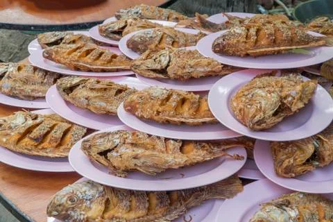 Many ruby fish fried in the pink plate Stock Photos