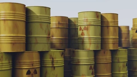 Many rusty barrels with nuclear waste are stacked on top of each other. Stock Footage 73453954