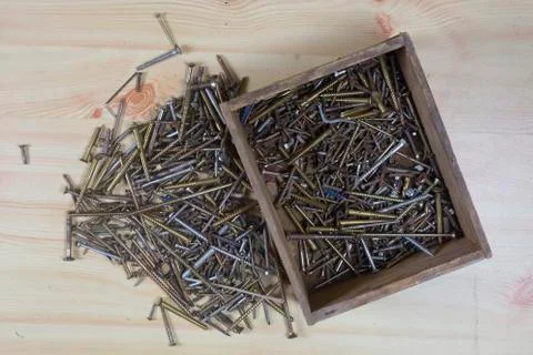 Many screws in a box Stock Photos