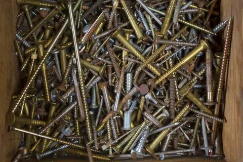 Many screws in a box Stock Photos