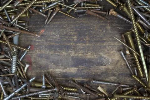 Many screws on a workbench Stock Photos