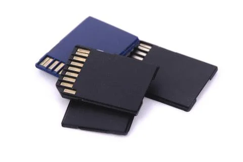 Many SD card digital storage device on white background isolated Stock Photos