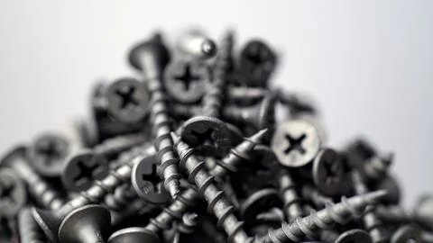 Many self tapping screws background Stock Photos