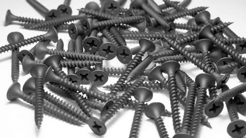 Many self tapping screws rotate motion background. Stock Footage 109036624
