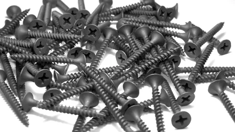 Many self tapping screws rotate motion background. Stock Footage 109036635