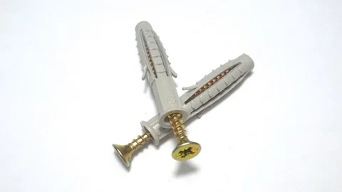 Many self tapping screws rotate motion background. Stock Footage 109036733