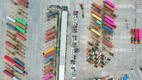 Many of Semi-trailer trucks stand at the distribution center Stock Footage 210787530