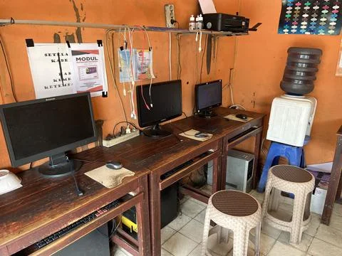 Many set of personal computer in a print shop Stock Photos
