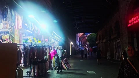 Many shirts hanging on a. Stock Footage 282999488