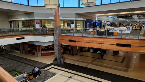 Many shops in multi-level department store or shopping mall. Customers prod.. Video stock 318543441