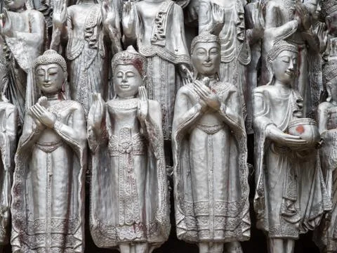Many silver Buddha statues Stock Photos