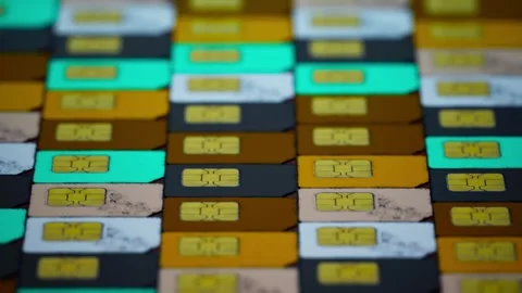 Many sim cards stacked on the ground led each other in rows of different col Video stock 257928355