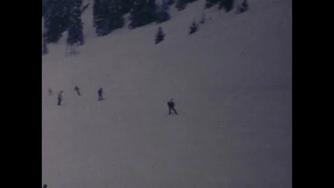 Many Skiers going down a hill Stock Footage 251835551