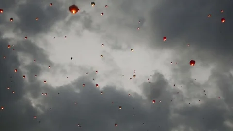Many sky lanterns in the sky. Floating lanterns ceremony or Yeepeng ceremony Stock Footage 81956573