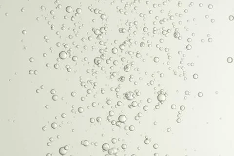 Many small fizz bubbles flows in a wine glass Stock Photos