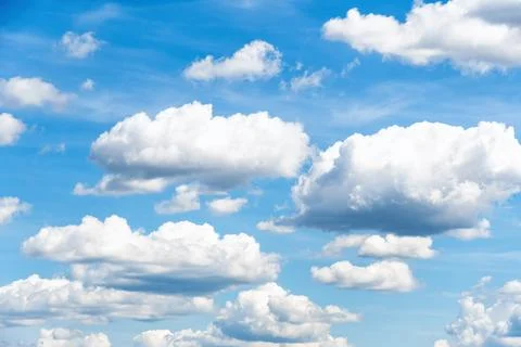 Many small fluffy clouds high up in the sky Stock Photos