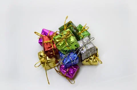 Many small multi-colored boxes for congratulations on a white background Stock Photos