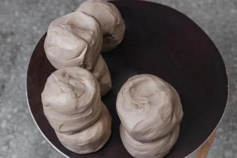 Many small pieces of white clay in potter studio before workshop 写真素材