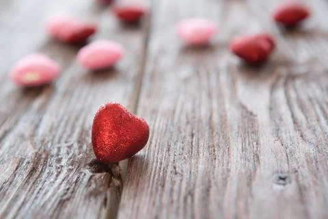 Many small red hearts on table Stock Photos