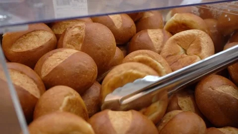 Many small, rosy, appetizing bread buns Stock Footage 143320749