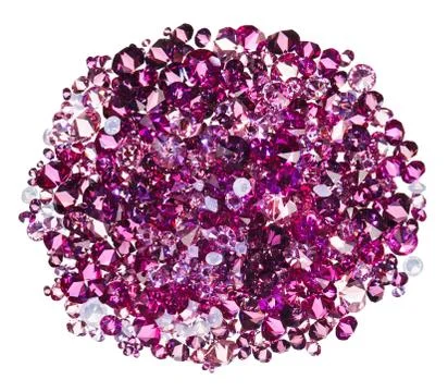 Many small ruby diamond (jewel) stones heap isolated on white Fotos Stock