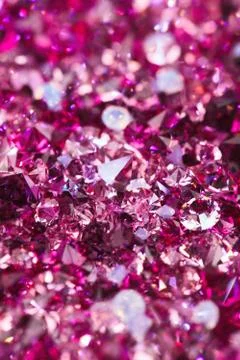 Many small ruby diamond stones, luxury background shallow depth of field Stock Photos