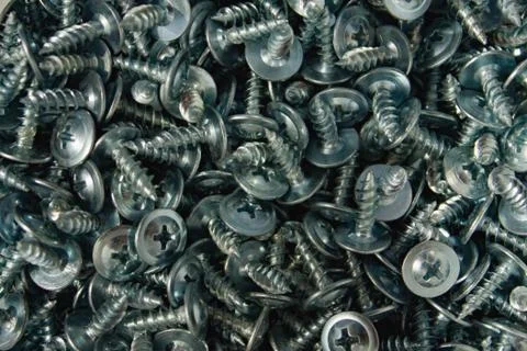 Many small screws Stock Photos