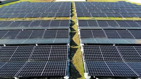 Many solar panels installed on a high-rise building. Top view Stock Footage 244806719