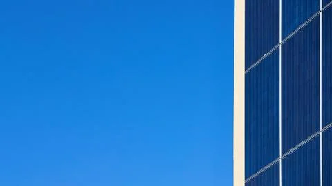 Many solar panels texture with copyspace. Building with lots of solar panels. Stock Photos