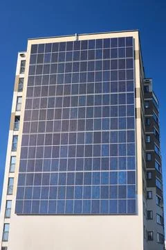 Many solar panels texture with copyspace. Building with lots of solar panels. Stock Photos