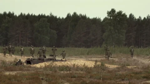 Many soldiers run with weapons Stock Footage 67254980