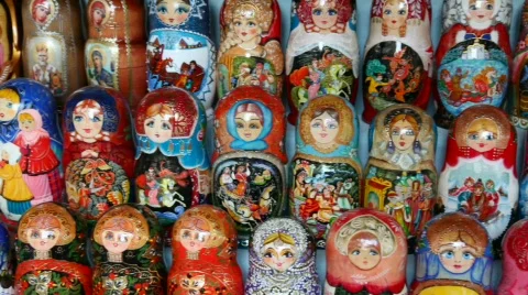 Many souvenir Russian wooden dolls, which are called Matryoshka are on counter Stock Footage 775497