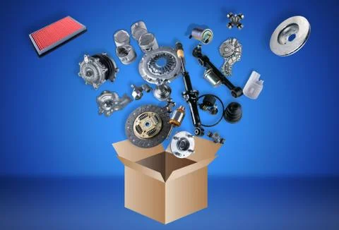 Many spare parts flying out of the box Stock Photos