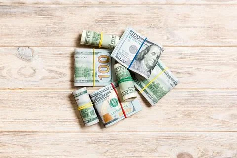 Many Stack of 100 dollar bills. Isolated on colored background top wiev wit.. Stock Photos