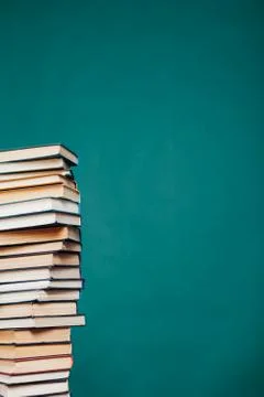 Many stacks of educational books for learning preparation for college exams on a 스톡 사진