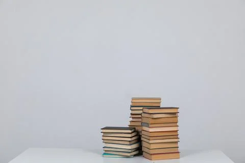 Many stacks of educational books to study in the university library on a Stock Photos