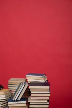 Many stacks of educational books to study in the university library on a Stock Photos