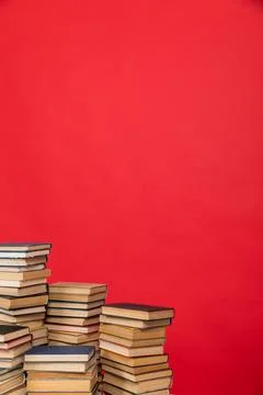 Many stacks of educational books to study in the university library on a Stock Photos