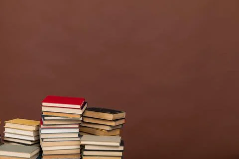 Many stacks of educational books to study in the university library on a Stock Photos