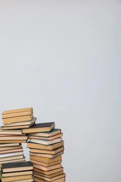 Many stacks of educational books to study in the university library on a Stock Photos