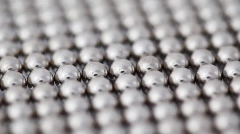 Many steel balls put up rows rotate Stock Footage 5163100